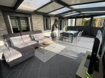 Coin salon dans l'établissement Gîte Cosy avec Jardin&Garage privé 10min de Reims