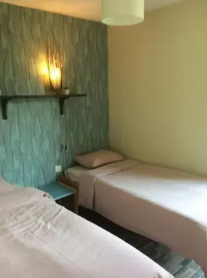 Un ou plusieurs lits dans un hébergement de l'établissement Gîte nature - 4 personnes à Signy-le-Petit