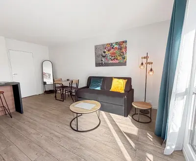 Coin salon dans l'établissement Studio Wi-Fi et balcon, très bien situé