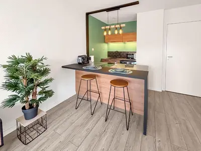 Cuisine ou kitchenette dans l'établissement Studio Wi-Fi et balcon, très bien situé
