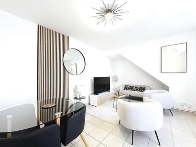 Coin salon dans l'établissement Le 24 appart rez-de-chaussée hyper-centre avec place de parking
