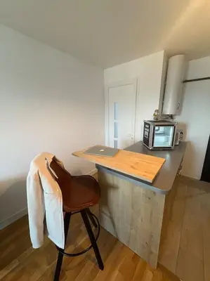 Cuisine ou kitchenette dans l'établissement Le 71 - Love Room Cozy - Disney 20min