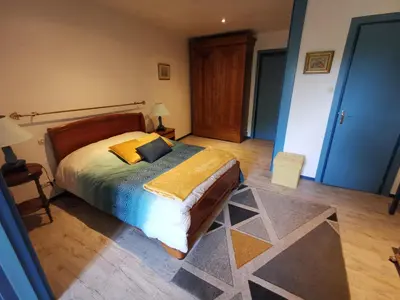 Un ou plusieurs lits dans un hébergement de l'établissement La maison du bonheur
