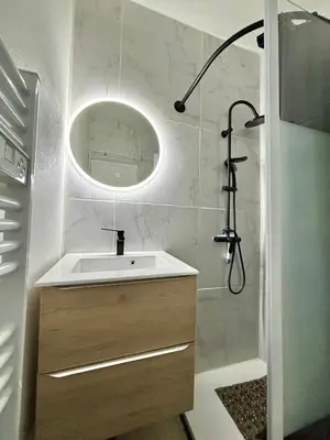 Salle de bains dans l'établissement Appartement Résidence Lenoir - Centre REIMS