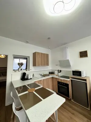 Cuisine ou kitchenette dans l'établissement Casa Armando, beau F2, 2 places de parking clos, proche Disneyland