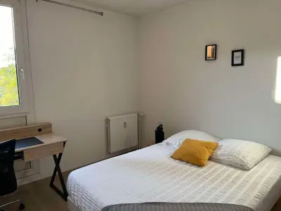 Un ou plusieurs lits dans un hébergement de l'établissement Duplex urbain spacieux à Compiègne