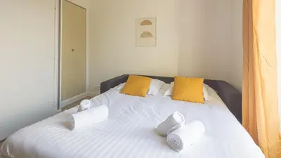 Un ou plusieurs lits dans un hébergement de l'établissement Sunshine - Appartement neuf - parking