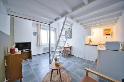 Cuisine ou kitchenette dans l'établissement Le Coquebert - Studio