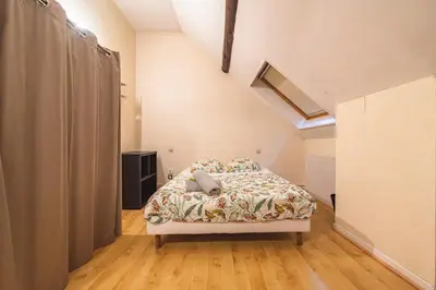 Un ou plusieurs lits dans un hébergement de l'établissement Grand appartement Reims gare centre 4 chambres