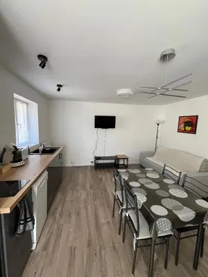 Télévision ou salle de divertissement dans l'établissement Charmant triplex, near Disney