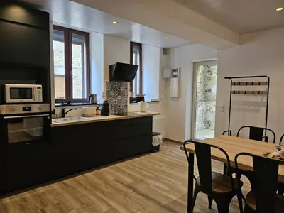 Cuisine ou kitchenette dans l'établissement Chez Mamie Café
