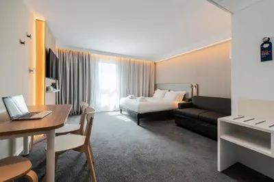 Un ou plusieurs lits dans un hébergement de l'établissement Holiday Inn Express & Suites Reims - Rives de Vesle by IHG