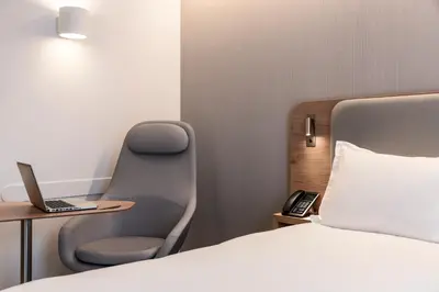 Un ou plusieurs lits dans un hébergement de l'établissement Holiday Inn Express & Suites Reims - Rives de Vesle by IHG