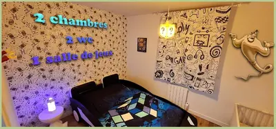 Un ou plusieurs lits dans un hébergement de l'établissement 15' de Disney maison à thème 75m2 avec SALLE DE JEUX privée 6 couchages