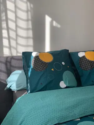 Un ou plusieurs lits dans un hébergement de l'établissement Chambres ou Appartement Cosy