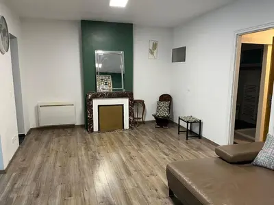 Coin salon dans l'établissement Suite K