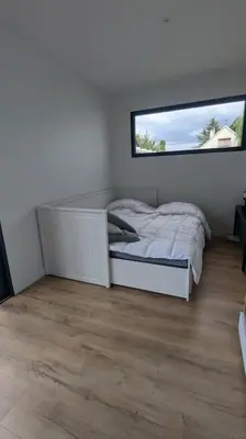 Un ou plusieurs lits dans un hébergement de l'établissement Jupiter Tiny House