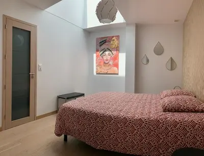 Un ou plusieurs lits dans un hébergement de l'établissement Loft avec Vue