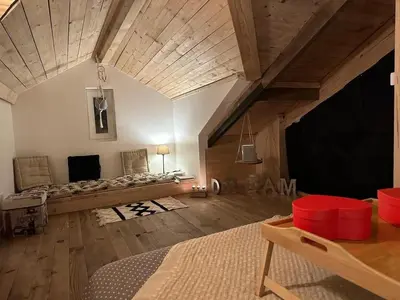 Télévision ou salle de divertissement dans l'établissement Le Charmant Spa