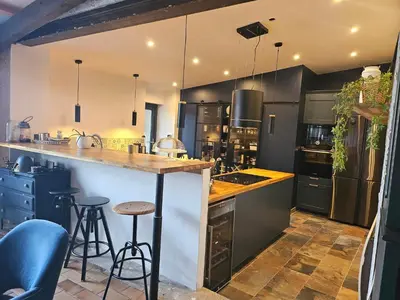 Cuisine ou kitchenette dans l'établissement Joli cocon familial