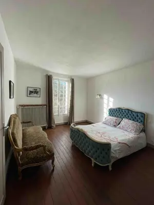 Un ou plusieurs lits dans un hébergement de l'établissement Grand Maison avec Piscine et Sauna
