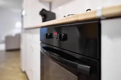 Cuisine ou kitchenette dans l'établissement Magnifique Appartement dans le Centre-Ville de Reims, Proche de la Gare et des Commodités
