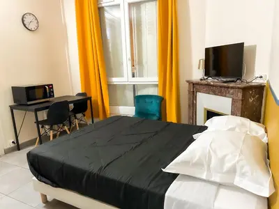 Un ou plusieurs lits dans un hébergement de l'établissement Studio SN2 - Centre-Ville Meaux - Proche Disneyland