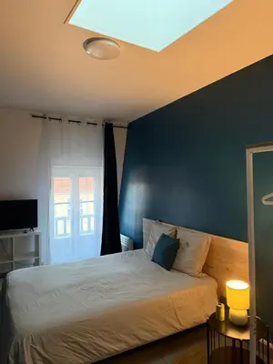 Un ou plusieurs lits dans un hébergement de l'établissement Studio SN9 - Centre-Ville Meaux - Proche Disneyland