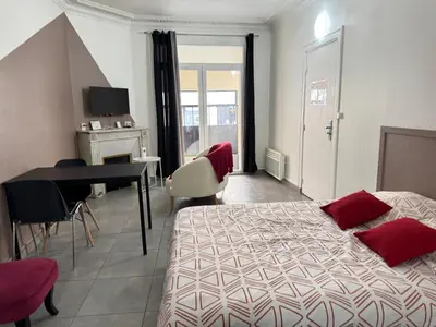 Un ou plusieurs lits dans un hébergement de l'établissement Studio SN1 - Centre-Ville Meaux - Proche Disneyland