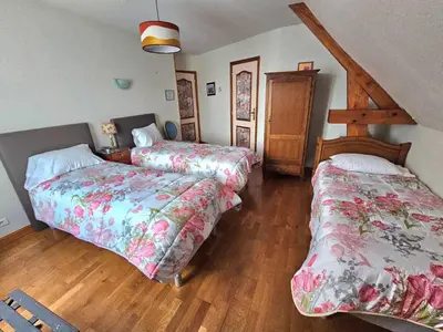 Un ou plusieurs lits dans un hébergement de l'établissement Chambres d'Hotes chez Renée