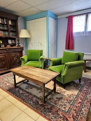 Coin salon dans l'établissement Chambres d'Hotes chez Renée