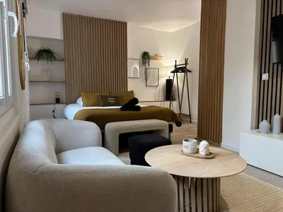 Coin salon dans l'établissement Le Lodge