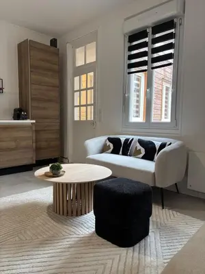 Coin salon dans l'établissement Le Lodge