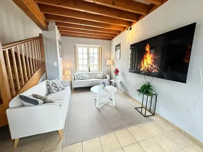 Coin salon dans l'établissement S Baylevéd'Air duplex vue château, Balnéo et sauna