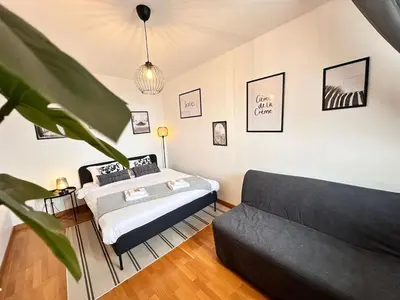 Coin salon dans l'établissement S Baylevéd'Air duplex vue château, Balnéo et sauna