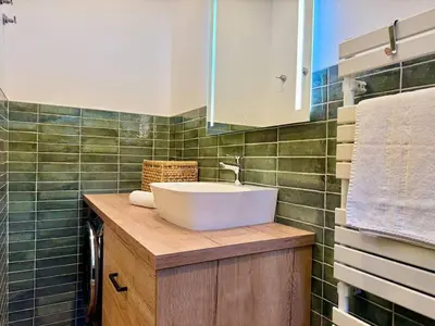 Salle de bains dans l'établissement La suite Jade de Reims - Cathédrale