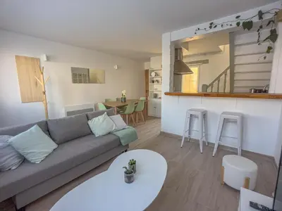 Coin salon dans l'établissement New Lovely cosy house with garden