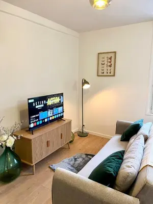 Coin salon dans l'établissement Cozy Margny - Neuf, Calme, Haut Débit & SmartTV