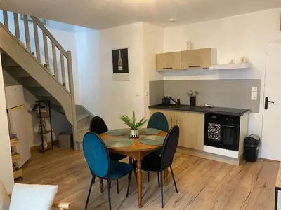 Cuisine ou kitchenette dans l'établissement Le 12 Epernay