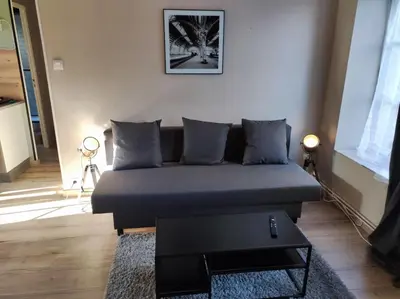 Coin salon dans l'établissement Appartement 4 personnes proche du château fort