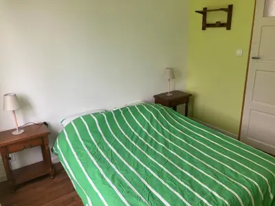 Un ou plusieurs lits dans un hébergement de l'établissement Appartement du Moulin
