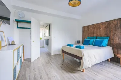 Un ou plusieurs lits dans un hébergement de l'établissement Azul Cosy charmant proche centre