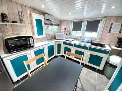 Cuisine ou kitchenette dans l'établissement Le pecheur de la semoy
