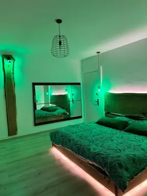 Un ou plusieurs lits dans un hébergement de l'établissement Loveroom en bords de Meuse