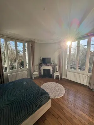 Télévision ou salle de divertissement dans l'établissement Super appartement proche Disney