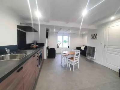 Cuisine ou kitchenette dans l'établissement Le Petite Maison