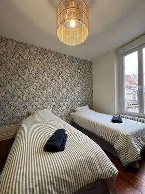 Un ou plusieurs lits dans un hébergement de l'établissement L'écrin des Tanneurs - 110m2 - 2 chambres - Epernay Hyper Centre