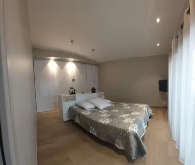 Un ou plusieurs lits dans un hébergement de l'établissement Bel appartement 140m2, terrasse au calme 20m2