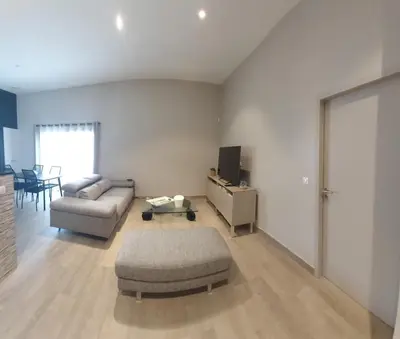 Coin salon dans l'établissement Bel appartement 140m2, terrasse au calme 20m2
