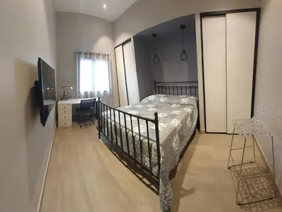 Un ou plusieurs lits dans un hébergement de l'établissement Bel appartement 140m2, terrasse au calme 20m2